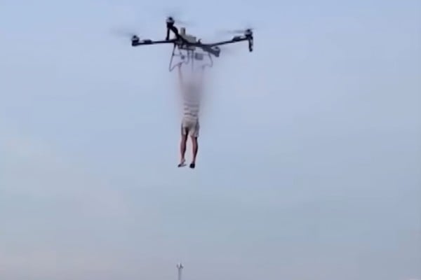 A person dangles from a drone in this still from footage obtained by Korean broadcaster JTBC allegedly showing a practice run for Park Wang-yeol’s escape. Photo: YouTube/JTBC_News A person dangles from a drone in this still from footage obtained by Korean broadcaster JTBC allegedly showing a practice run for Park Wang-yeol’s escape. Photo: YouTube/JTBC_News