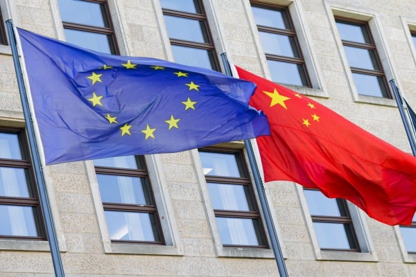 The Europe Union and Chinese flags. Photo: Getty Images The Europe Union and Chinese flags. Photo: Getty Images