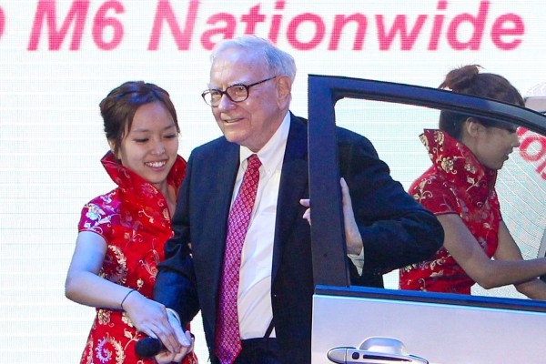 In this 2010 image, Warren Buffett is seen at a BYD product-launch conference in Beijing, two years after the company he founded, Berkshire Hathaway, invested in the Chinese automaker. Photo: Getty Images