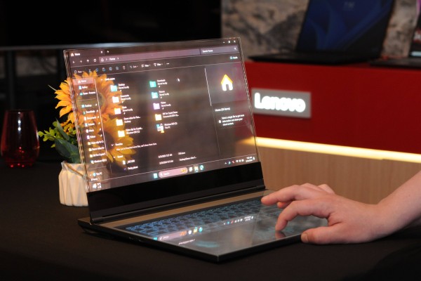 A Lenovo laptop with a transparent screen is displayed at the Mobile World Congress in Spain. Photo: dpa