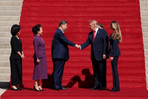 US President Donald Trump and Chinese President Xi Jinping shake hands alongside US first lady Melania Trump and Chinese President Xi Jinping’s wife Peng Liyuan, at the National in Washington on Friday. Photo: Reuters US President Donald Trump and Chinese President Xi Jinping shake hands alongside US first lady Melania Trump and Chinese President Xi Jinping’s wife Peng Liyuan, at the National in Washington on Friday. Photo: Reuters