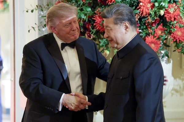 US President Donald Trump welcomes Chinese President Xi Jinping to a state dinner in the East Room of the White House on Thursday in Washington. Photo: Getty Images