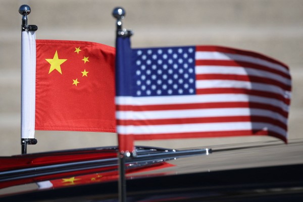 Flags of China and the US adorn a car in the motorcade of US President Donald Trump as he visits the National Archives Museum with Chinese President Xi Jinping on September 25, 2026, in Washington. Photo: Getty Images via AFP