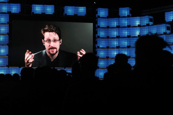 Former US National Security Agency contractor Edward Snowden addresses attendees through video link at a technology conference in Lisbon on November 4. Photo: AP