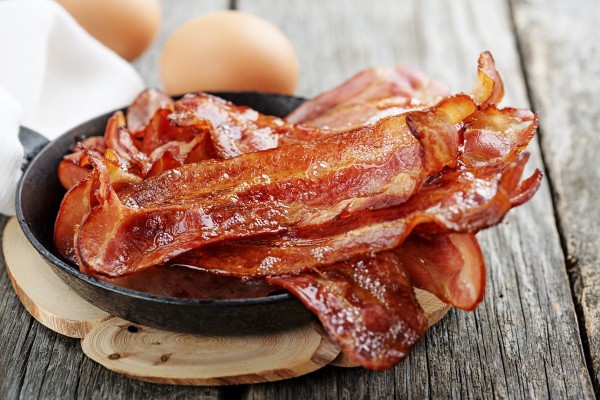 The keto diet, or ketogenic diet, requires eating high-fat, low-carbohydrate foods such as bacon. Starving the body of carbohydrates makes it burn fat, but research suggests the body reacts by building up stores of fat again. Photo: Shutterstock