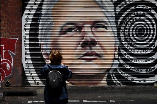 A mural of Australia’s Julian Assange in Melbourne. Photo: AFP A mural of Australia’s Julian Assange in Melbourne. Photo: AFP