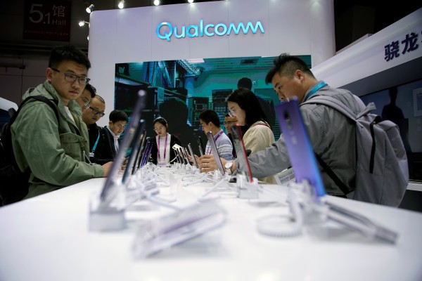A Qualcomm sign is seen at the China International Import Expo (CIIE) in Shanghai. Photo: Reuters