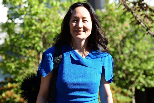 Huawei Technologies executive Meng Wanzhou leaves her Vancouver home to attend her extradition hearing in the Supreme Court of British Columbia on Wednesday. Photo: AFP