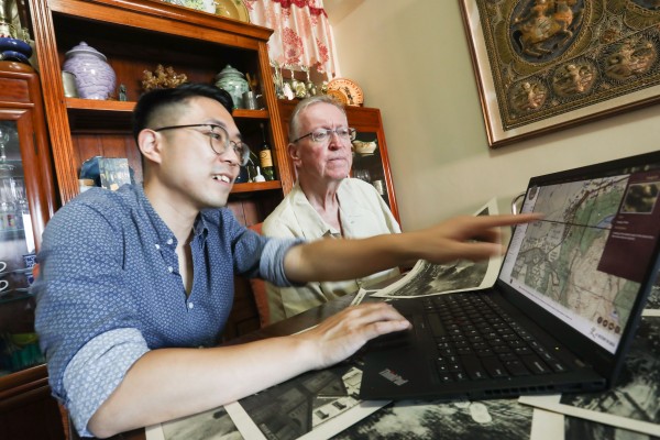Baptist University associate history professor Kwong Chi-man (left) and historian Tony Banham explain the new database. Photo: Jonathan Wong