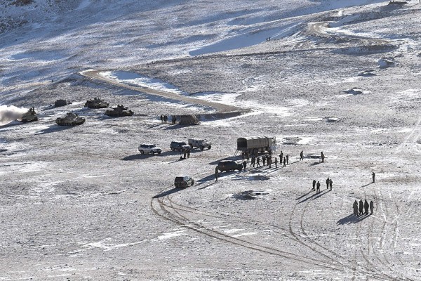 Chinese soldiers and tanks carry out disengagement exercises along the border with India in Ladakh in February. Photo: Handout via AFP