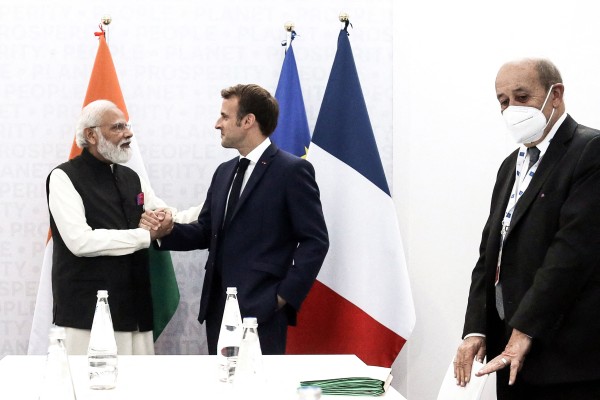 Indian Prime Minister Narendra Modi shakes hands with French President Emmanuel Macron during a bilateral meeting at the G20 leaders’ summit in Rome on Friday. Photo: AFP