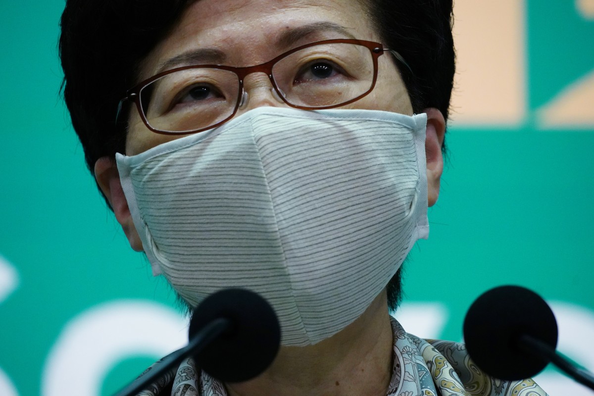 Chief Executive Carrie Lam Cheng Yuet-ngor meets the press at the Central Government Offices in Tamar, wearing the new reusable CuMask+.