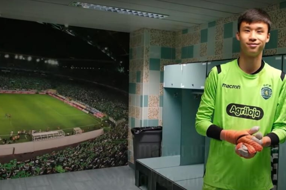 Hong Kong teen Ng Yee-sun shows off his new football kit. He's currently playing for Portuguese Primeira Liga side Sporting, which boasts alumni such as Luis Figo and Cristiano Ronaldo.