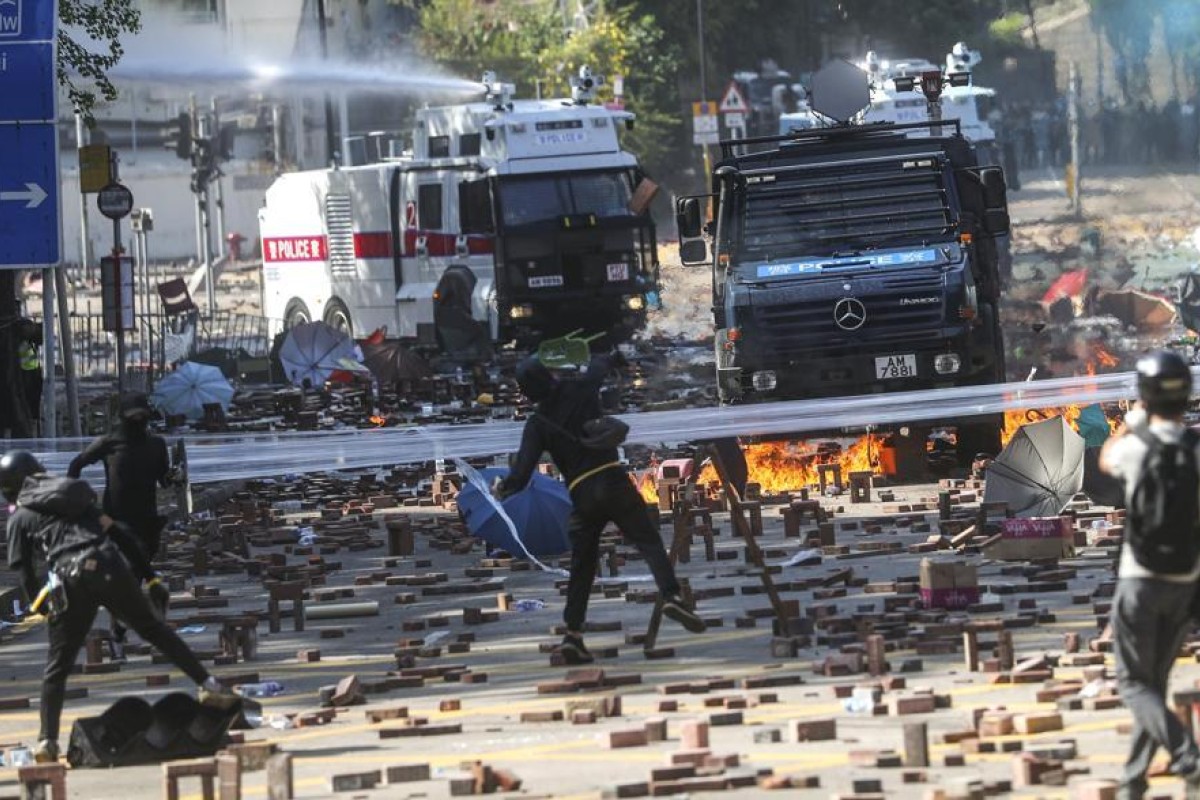 Clashes at Poly U involved water cannons, armoured vehicles, and more. Photo: SCMP / Sam Tsang