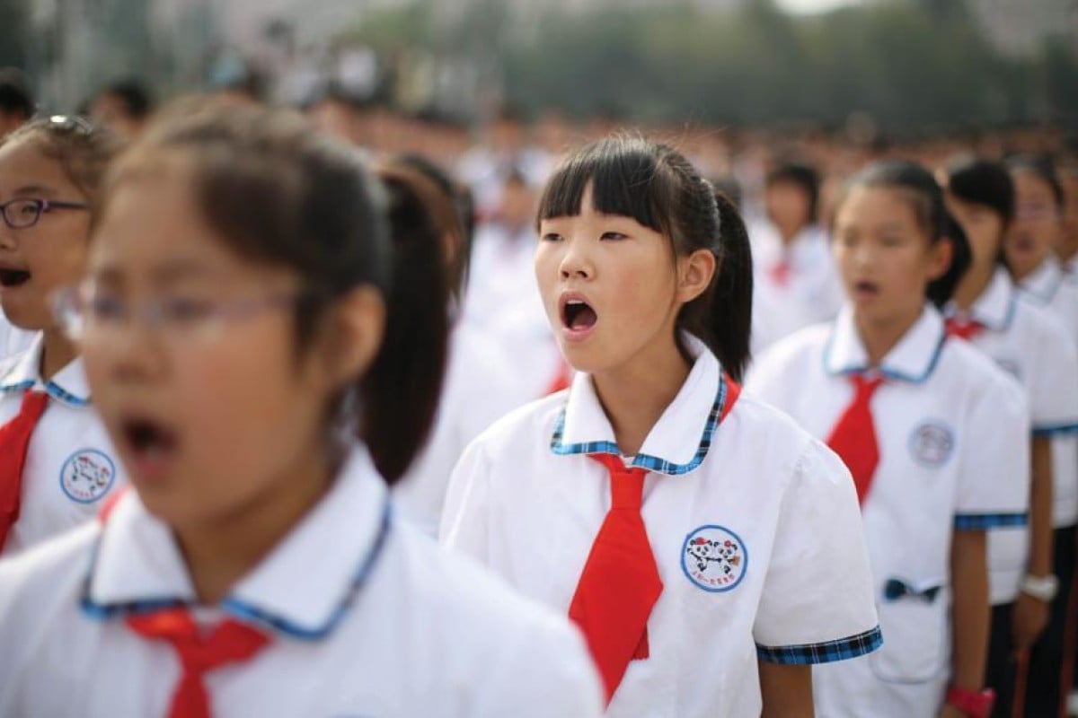 Schools need to observe students’ conduct while they are singing the national anthem, according to the Education Bureau. Photo: Xinhua