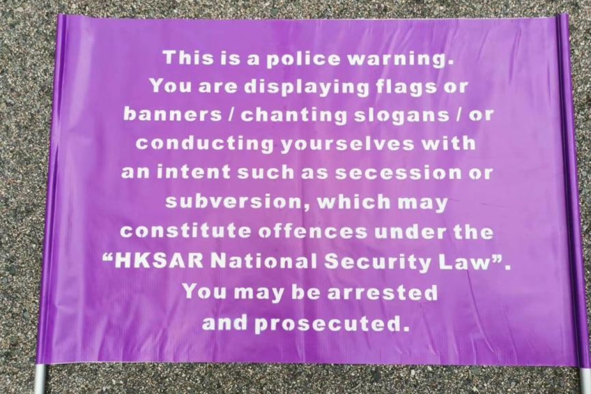 Police have made a new flag warning against behaviour that could break the new national security law. Photo: Handout
