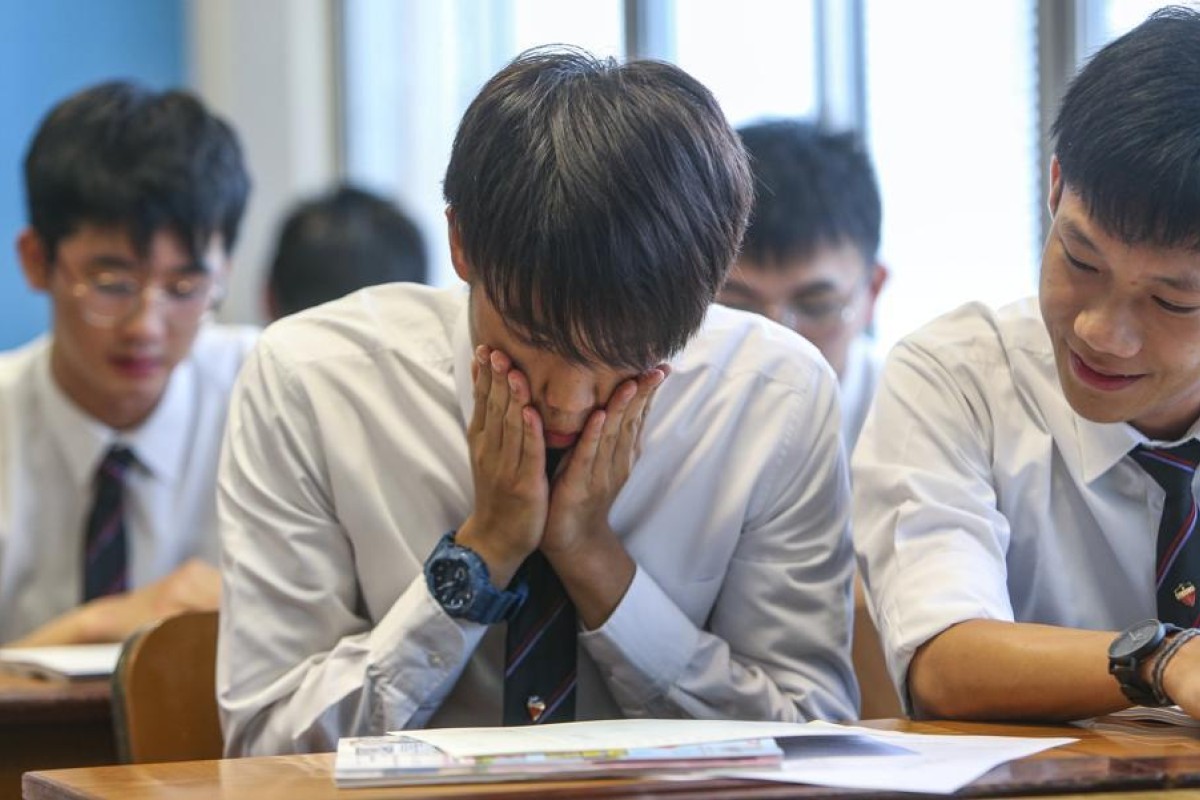 Students at La Salle College in Kowloon Tong react upon receiving their DSE results. Photo: SCMP / Winson Wong