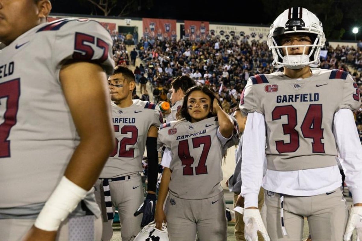 Dalia Hurtado is a one-girl lesson in diversity; the Mexican-American student plays five different sports and breaks gender stereotypes by playing on her school's American football team. Photo: TNS