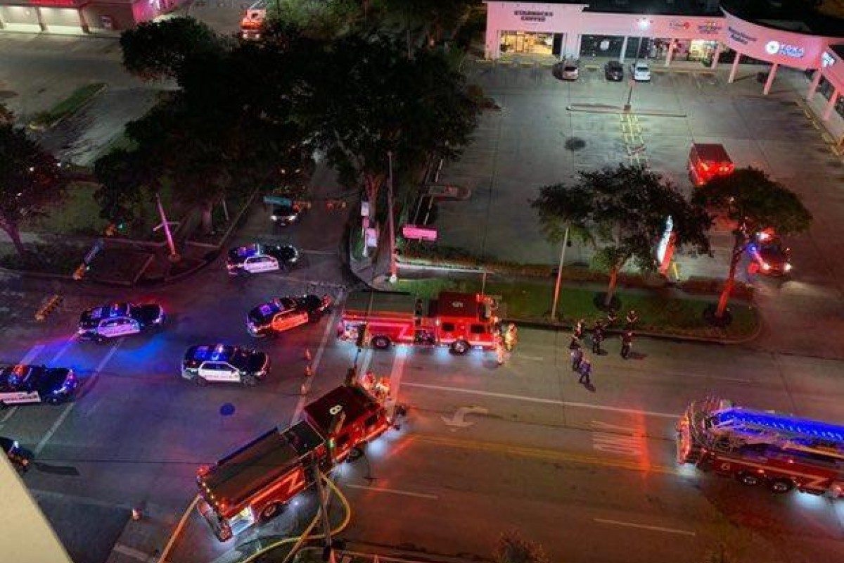 Emergency services attend the Chinese consulate in Houston, Texas, after it was reported that documents were being burned in the building's courtyard. Photo: Twitter