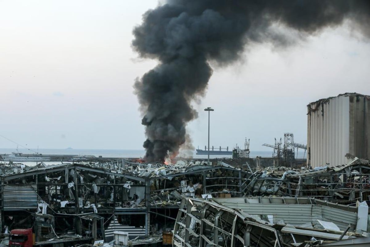 Thick smoke billows from the site where a massive explosion rocked Beirut's port. Photo: DPA