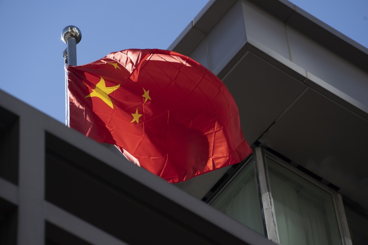 New regulations ban flying the national flag upside down and introduce new regulations for how it's presented on the internet. Photo: AFP