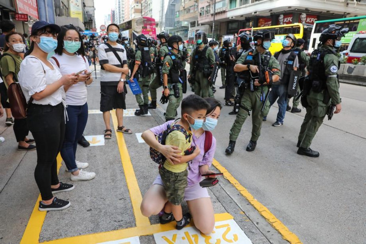 289 people were arrested on Sunday during protests against the government's decision to postpone elections and the sweeping national security law imposed by Beijing. Photo: SCMP/ May Tse