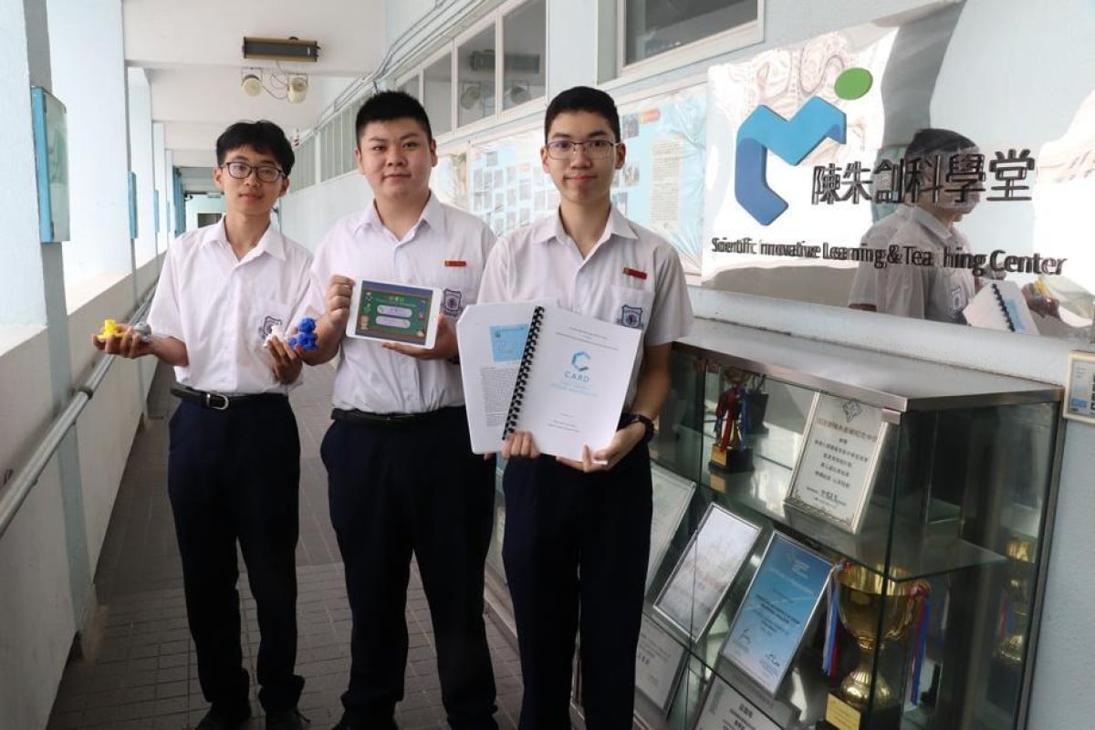 Hong Kong Student Science Project Competition senior secondary invention category champions, Christian Alliance S W Chan Memorial College students Mario Fong Ka-ho, Ifan Cheung Choi-chun and Tommy Wong Lok-him (from left). Their project was titled ‘Augmented Reality Game for Identifying Early-age School Kids with Dyslexia’.