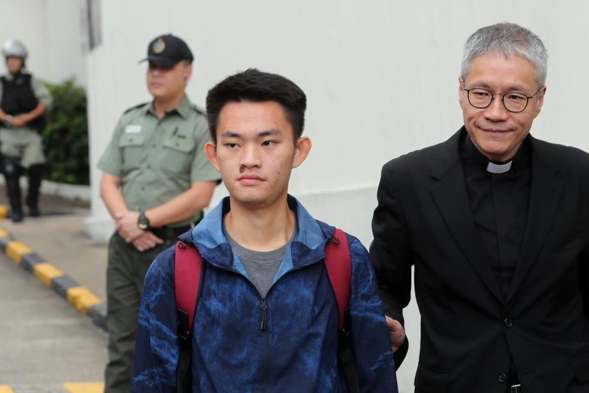 Chan Tong-kai (left) leaves Pik Uk Correctional Institution in Clear Water Bay in October last year, accompanied by Reverend Canon Peter Koon Ho-ming. Photo: SCMP/ Sam Tsang