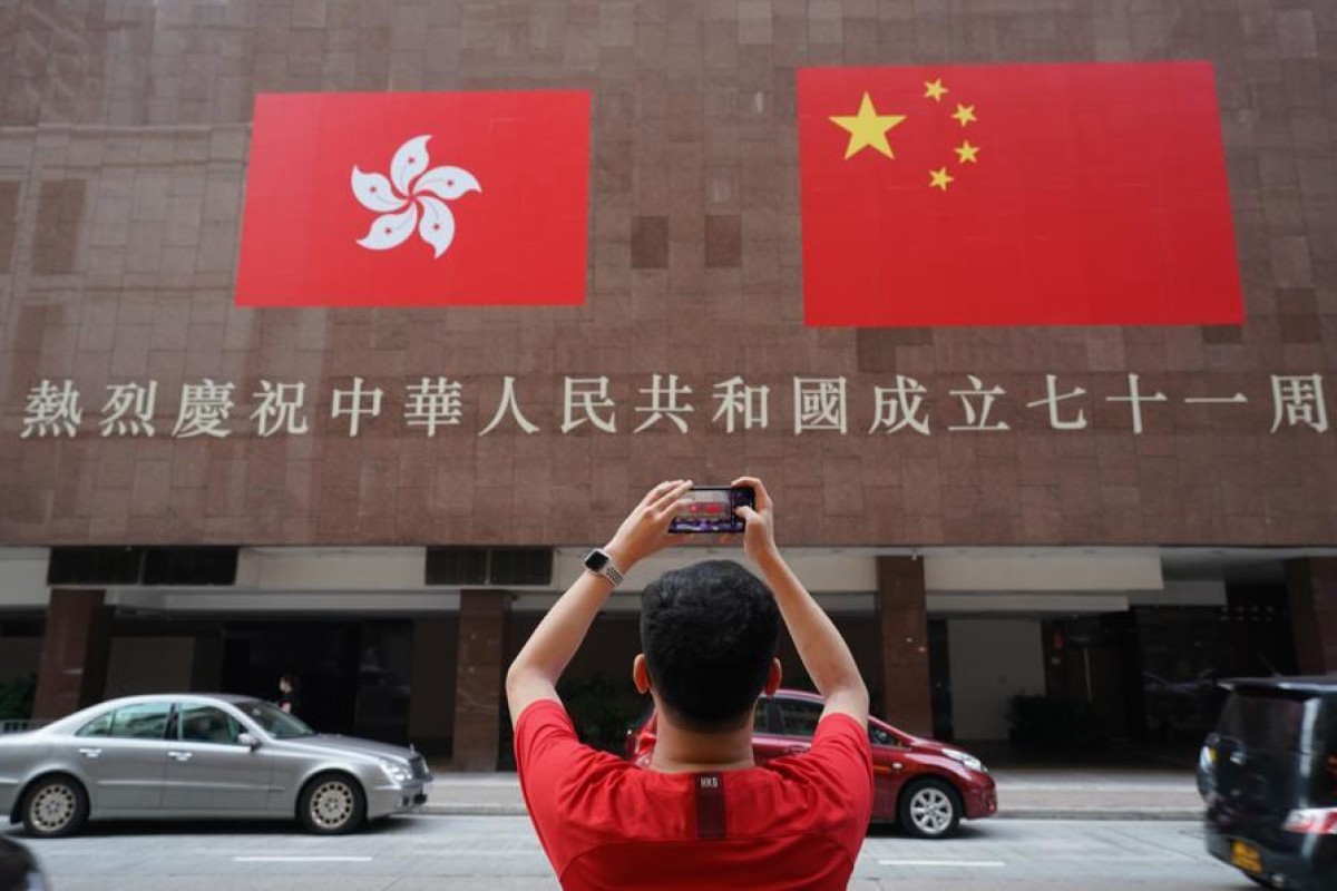 The chief of Beijing's liaison office in Hong Kong has said that loving China is a duty rather than a choice. Photo: SCMP/ Felix Wong