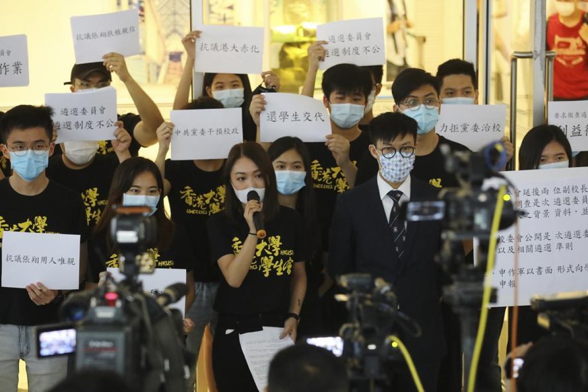 Members of HKU’s student union voice their opposition to the appointment of two professors to the university’s senior management. Photo: SCMP/ Dickson Lee