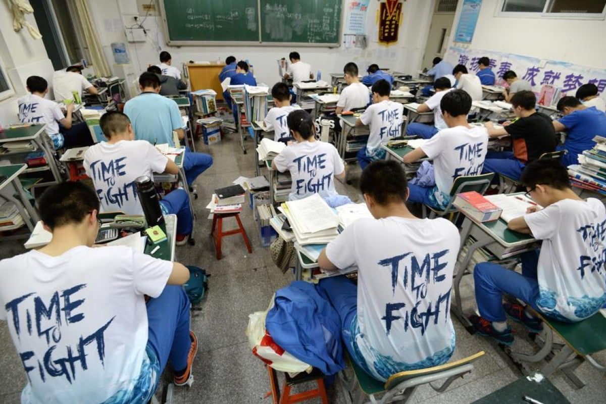 Chinese high school students study late at night for the annual 'Gaokao', or college entrance examinations, in Handan, Hebei Province, China. Photo: EPA