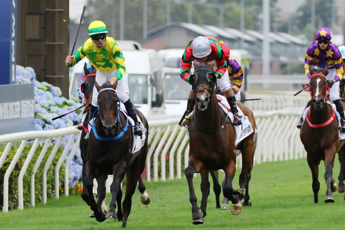 Joao Moreira salutes as Sky Darci wins the BMW Hong Kong Derby on Sunday. Photo: Kenneth Chan