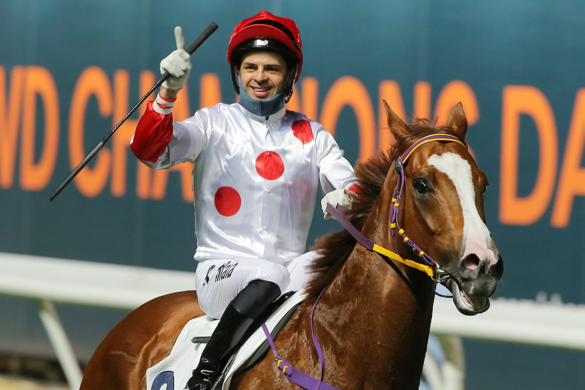 Ruan Maia celebrates his win aboard Wine And Wine at Happy Valley on Thursday night. Photos: Kenneth Chan