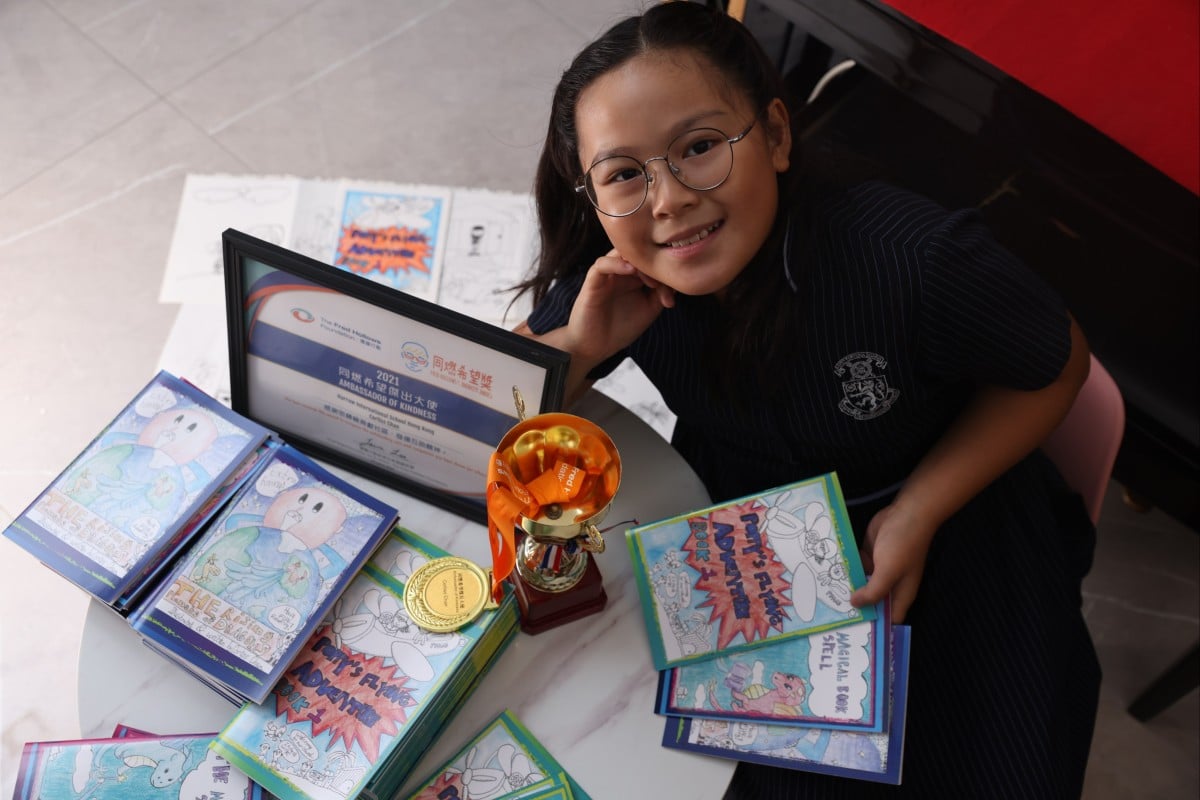 Corliss Chan, 9, has published a mini-book during her qauarantine earlier this year. She has sold 110 copies to friends and raised HK$13,500 for charity. Photo: K. Y. Cheng