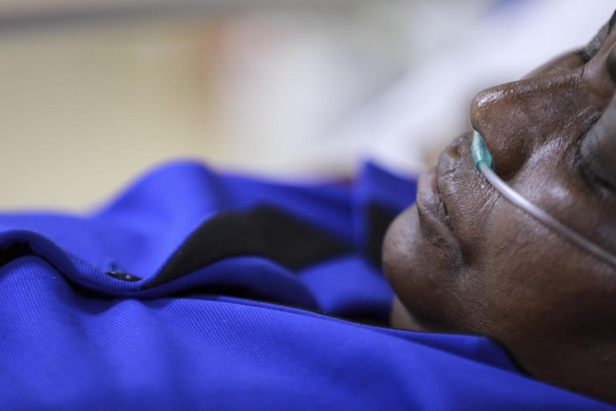 A patient with coronavirus rests inside an Intensive Care Unit (ICU) at the Machakos Level 5 hospital in Machakos, Kenya. A new study found that many Covid patients still have ‘long Covid’ symptoms, even a year after being hospitalised. Photo: EPA
