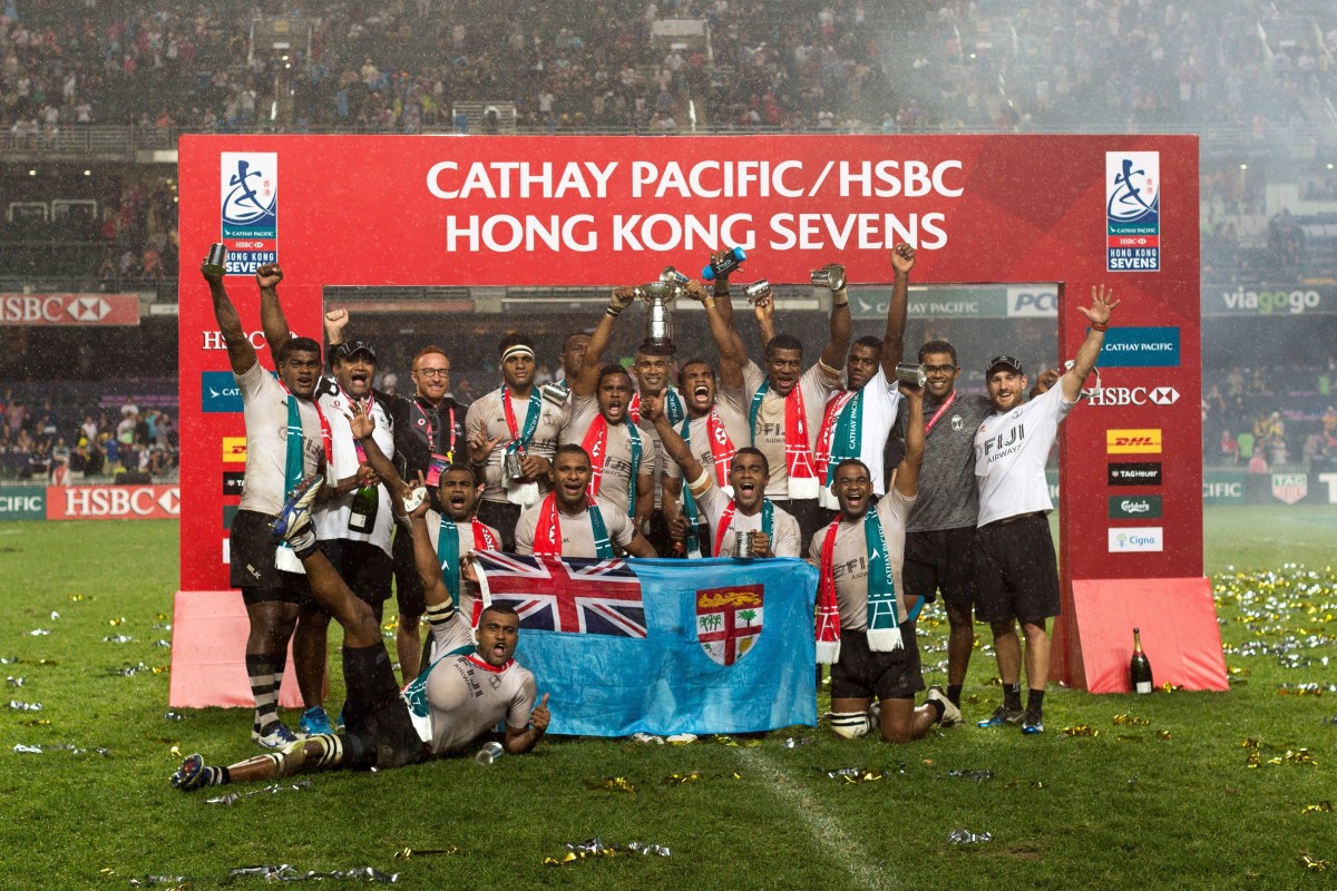 The Fiji team celebrates after winning against New Zealand during the Hong Kong Rugby Sevens tournament. Photo: EPA