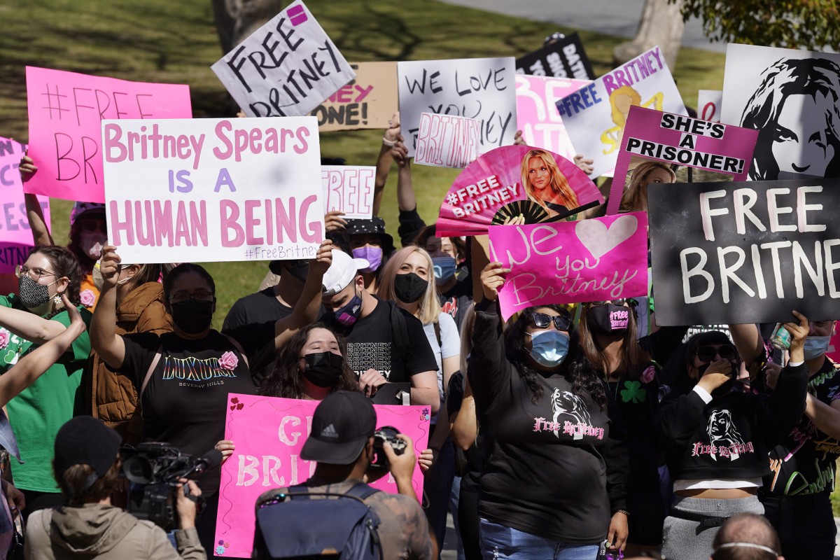 Britney Spears fans hold signs outside a court hearing concerning the pop singer’s conservatorship. Photo: AP