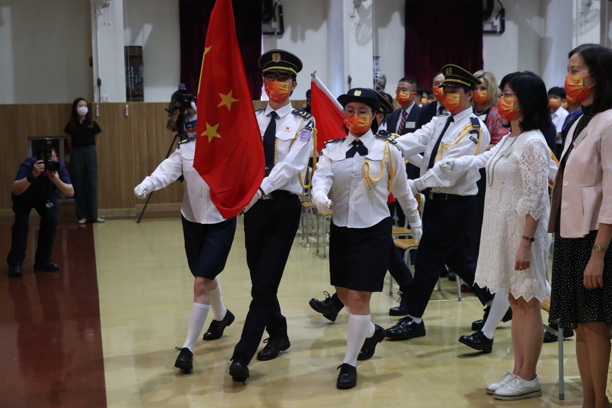 Flag-raising ceremony at the Fukien Secondary School in Siu Sai Wan on the National Day. Photo: Edmond So