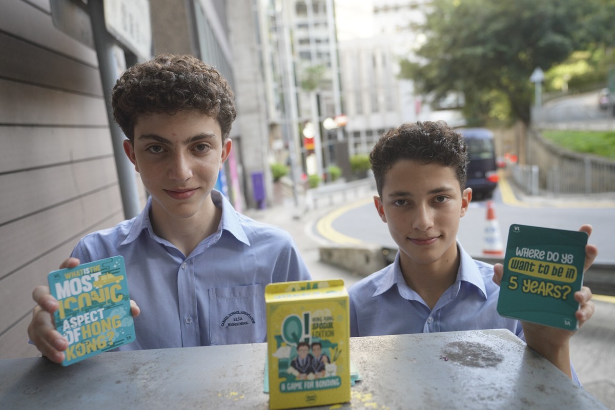 Gabriel Wigisser (left) and his brother Alex are the creators of Q!, a card game to help people survive Hong Kong’s three-week quarantine. Photo: Winson Wong