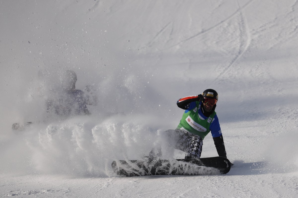 Snowboarder Jakob Dusek in action during the men’s Snowboard Cross semi final. Preparations for the Beijing 2022 Winter Olympics have already begun, but many people are still calling for a boycott of the Games, saying attending the Olympics would show support for Beijing’s alleged human rights abuses. Photo: Reuters