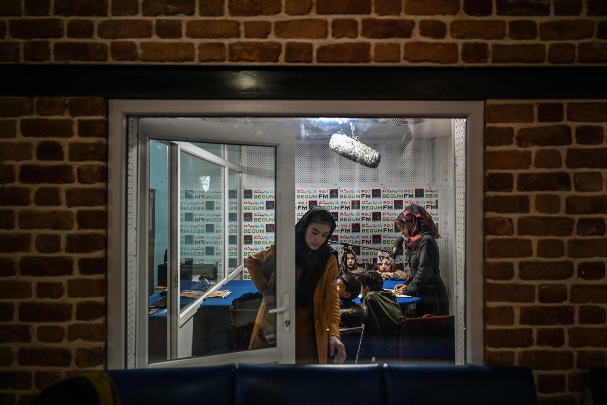 Teachers and students attending a class on-air at Radio Begum in Kabul. From Taliban-controlled Kabul, the radio station is broadcasting the voices of women that have been muted across Afghanistan. Photo: AFP