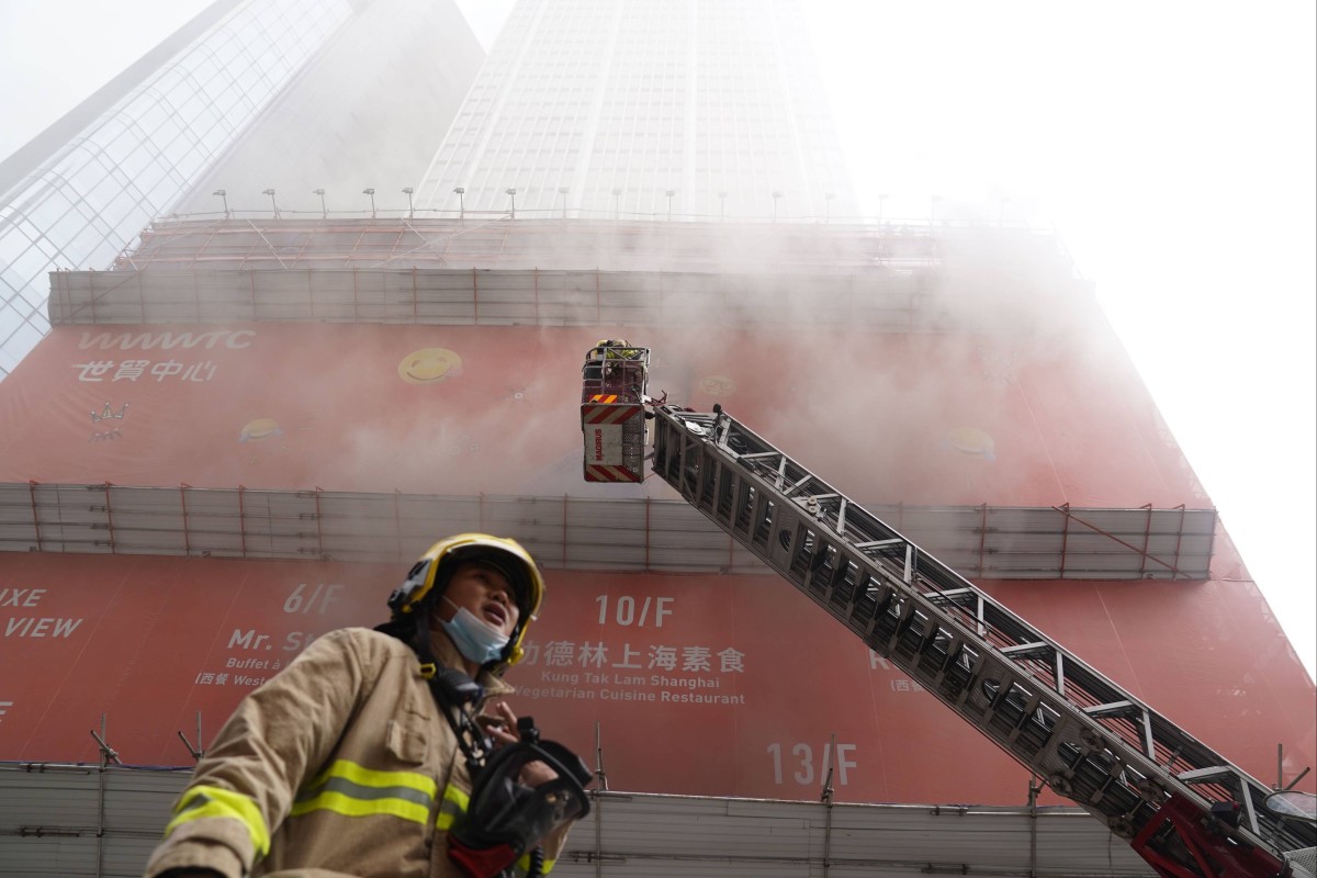 Preliminary investigation suggested the blaze broke out in an electrical switch room in the first floor of the shopping mall, before spreading to scaffolding that is covering part of the building. Photo: SCMP/ Sam Tsang