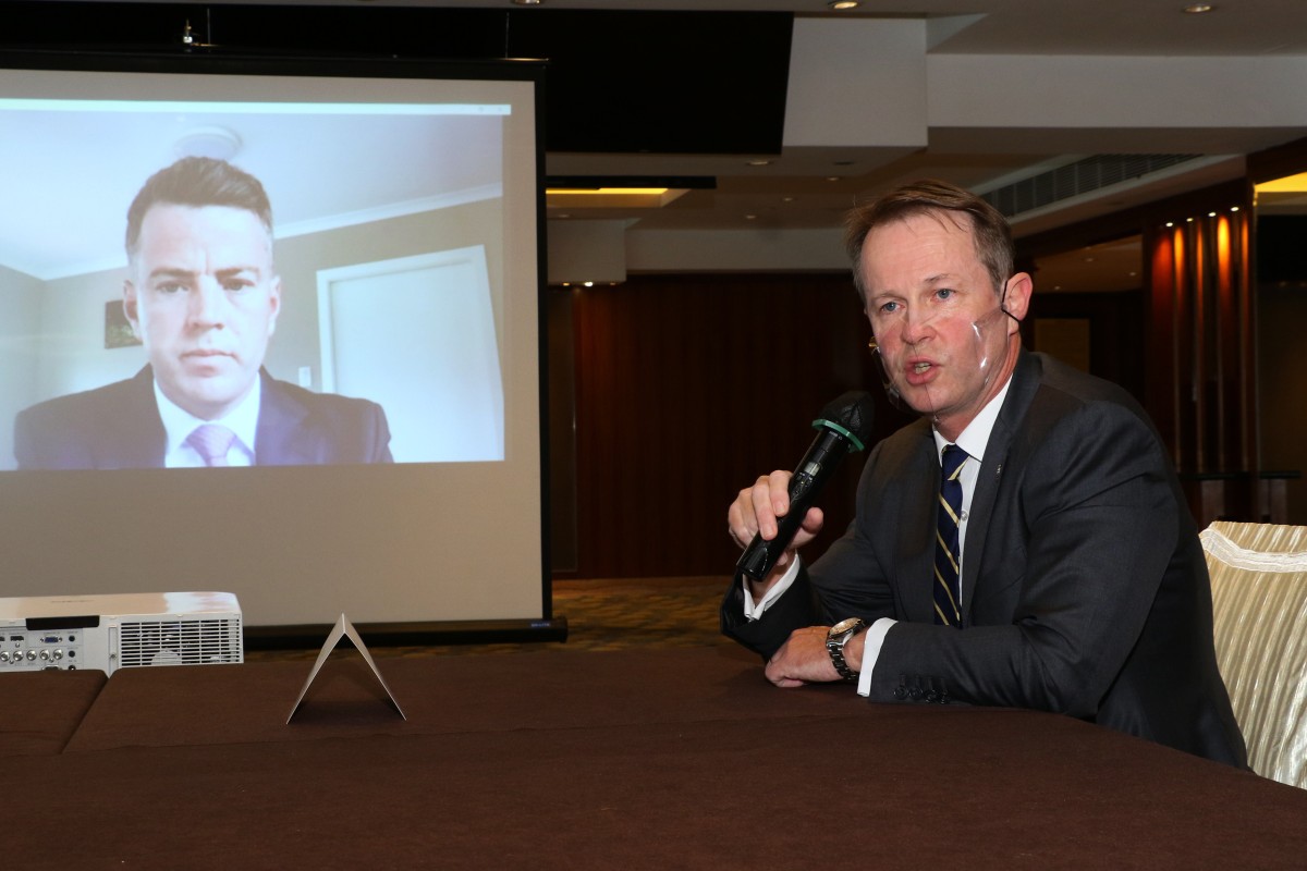 Jockey Club official Andrew Harding introduces new trainer Jamie Richards. Photo: Kenneth Chan