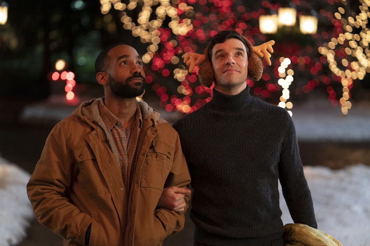 Philemon Chambers, left, as Nick and Michael Urie as Peter in “Single All The Way”, Netflix’s first LGBTQ+ Christmas film. Photo: Netflix/TNS