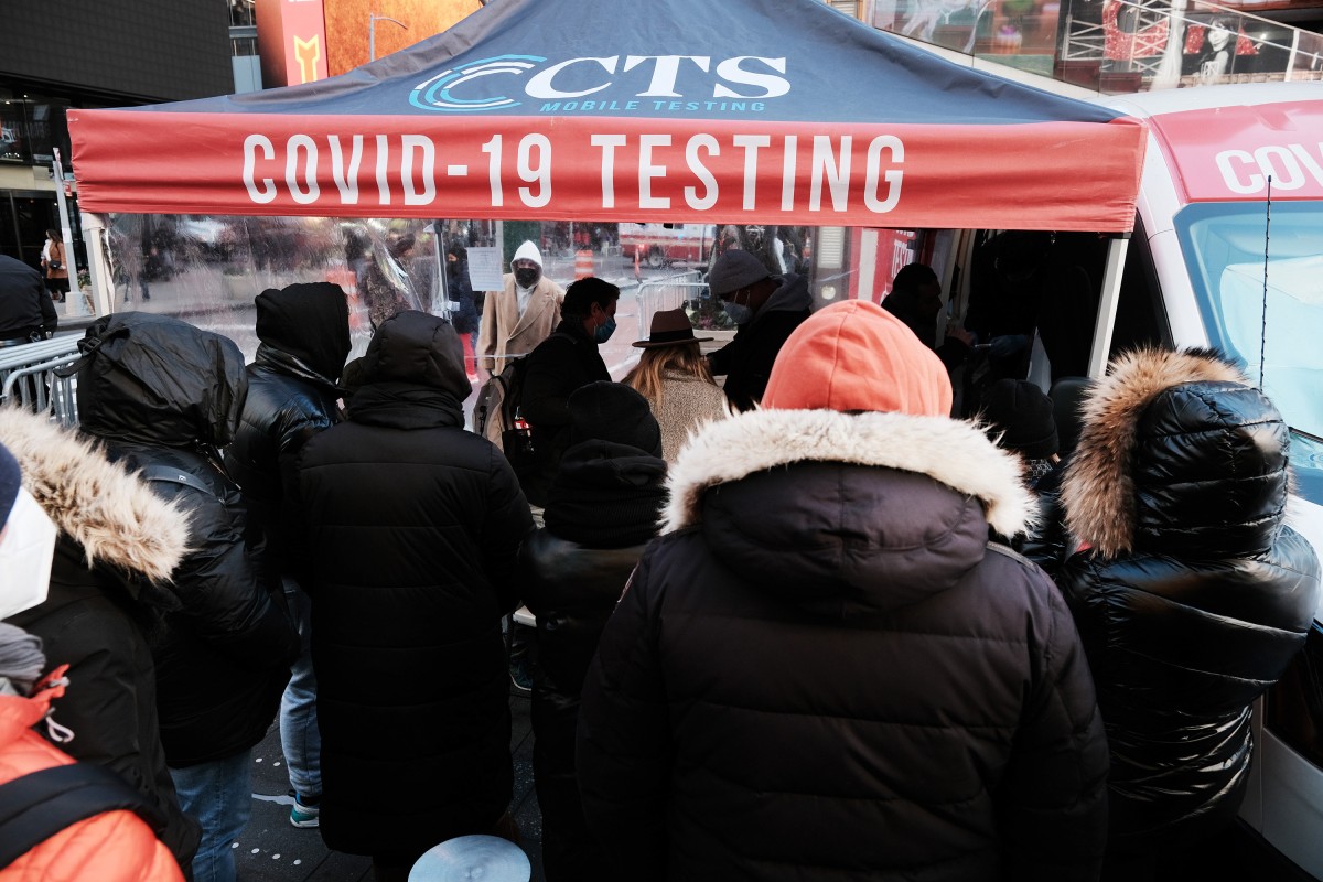 People waiting in long lines in Times Square, New York to get tested for Covid-19. New York City has once again seen case numbers surge as Omicron variant becomes dominant. Photo: TNS