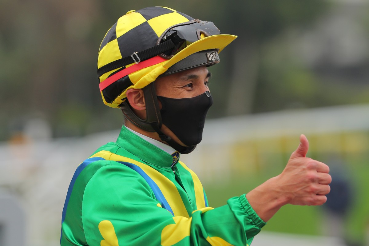 Alfred Chan celebrates his victory aboard Kasi Farasi at Sha Tin on Monday. Photo: Kenneth Chan