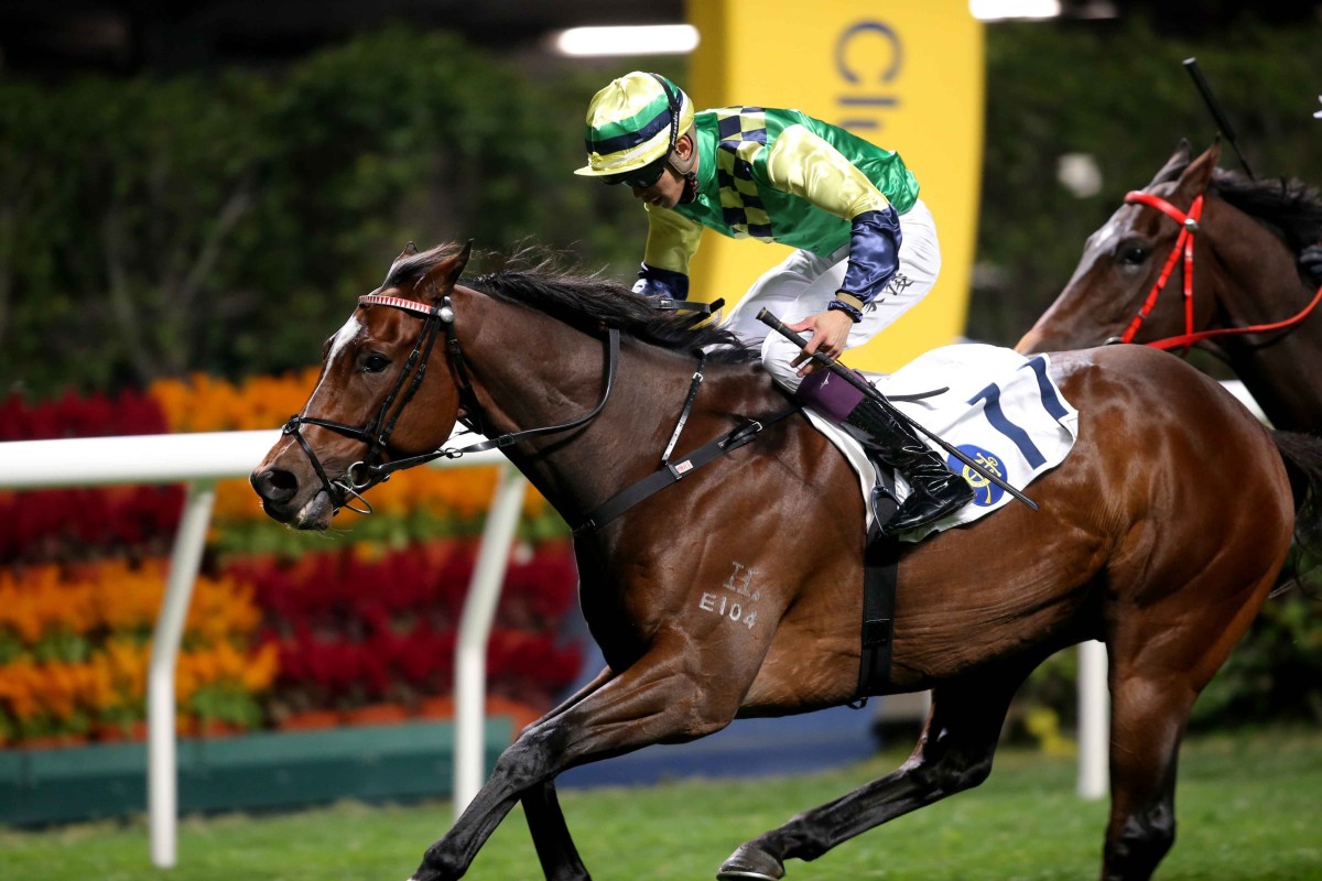 Derek Leung guides the Ricky Yiu-trained Off The Reel to victory at Happy Valley on Wednesday night. Photo: HKJC