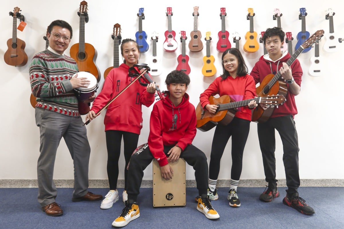 (Left to right) Tai Kwong Hilary College Founding Principal John Cheung and students Chloe Chow, Karson Cheung, Ginny Yip, and Daniel Mak at the school in Tai Po. Photo: Jonathan Wong