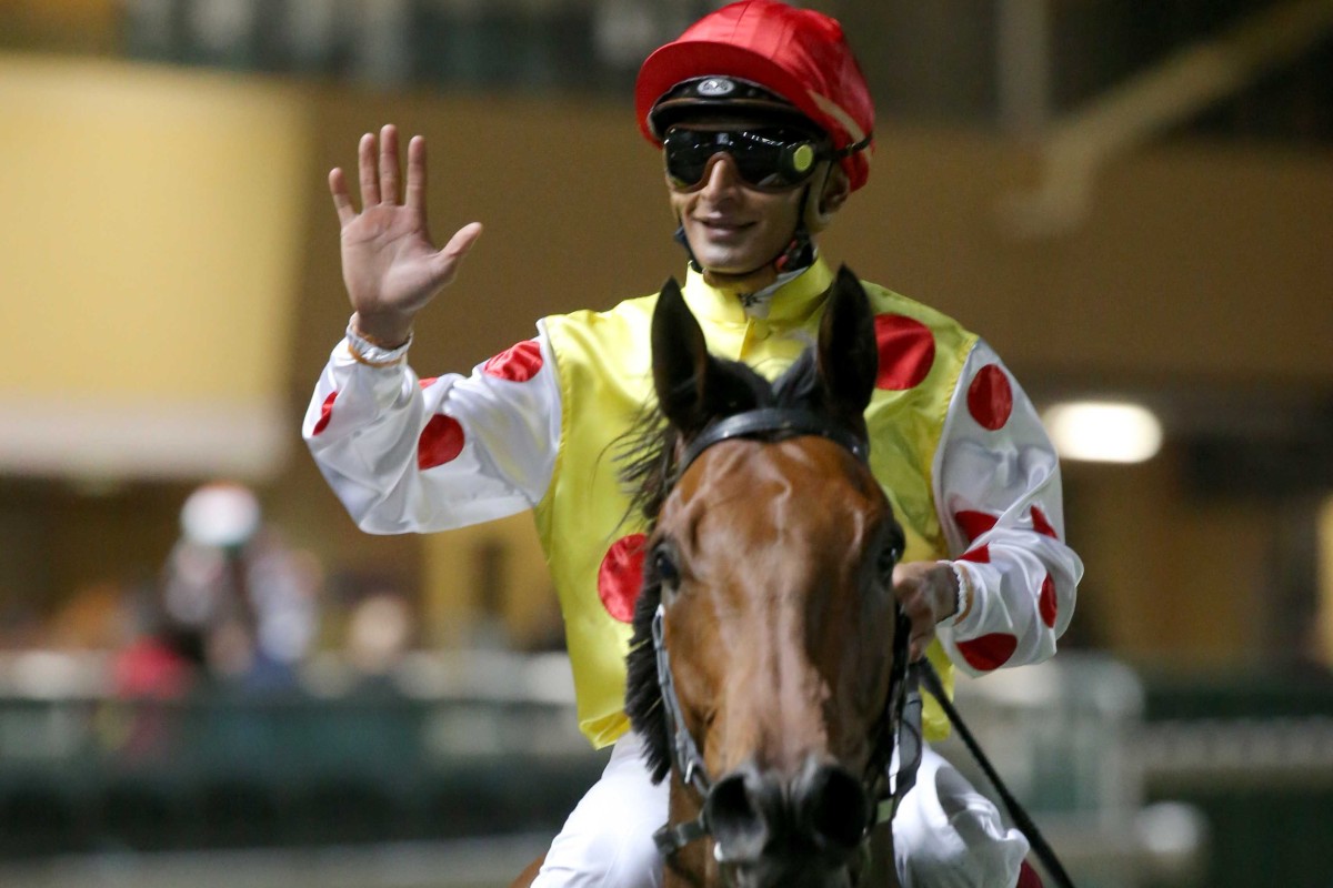 Karis Teetan celebrates his 500th Hong Kong winner aboard Shadow Runner. Photo: HKJC