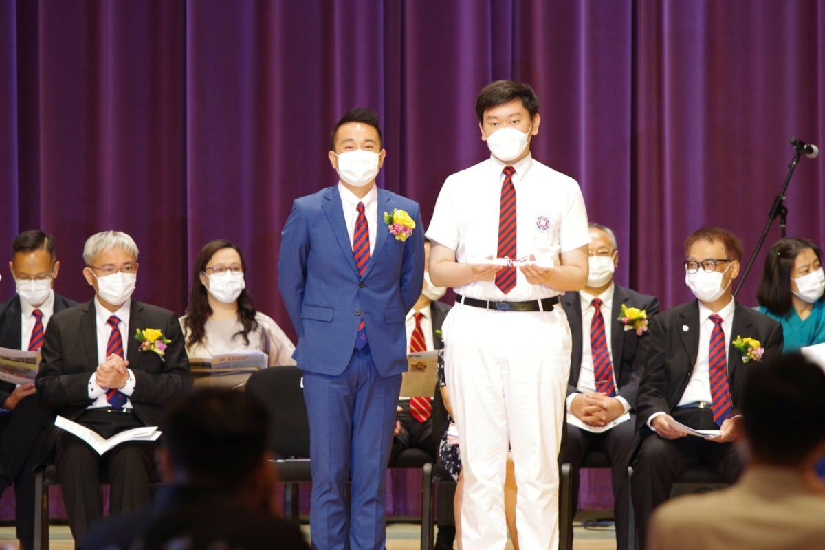 Gold Award winner Chan Tsz-hin (right), who graduated from Pui Ching Middle School in 2021, conducted his award-winning research “On Non-Torsion Solutions of Homogeneous Linear Systems over Rings”. Photo: Handout